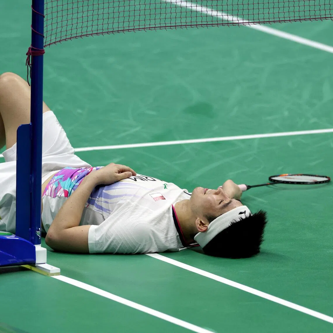 Singapore’s Loh Kean Yew falls to his second straight defeat by Canada’s Victor Lai at the Badminton World Federation World Championships.