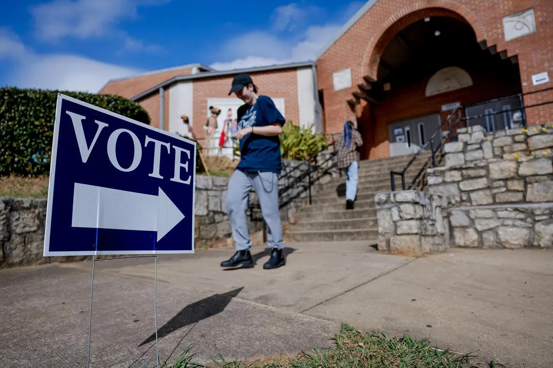 Citizens taking part in early voting at an advance polling location in Atlanta, Georgia, on Oct 30.