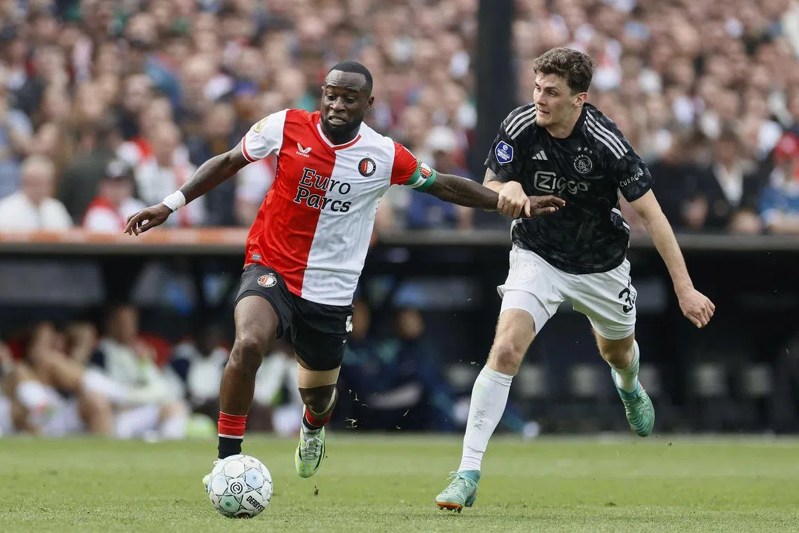 Feyenoord defender Lutsharel Geertruida and Ajax midfielder Benjamin Tahirovic in the Dutch Eredivisie match at the De Kuip stadium in Rotterdam on April 7, 2024. The Sept 1 clash has been called off, as public safety "cannot adequately be guaranteed".