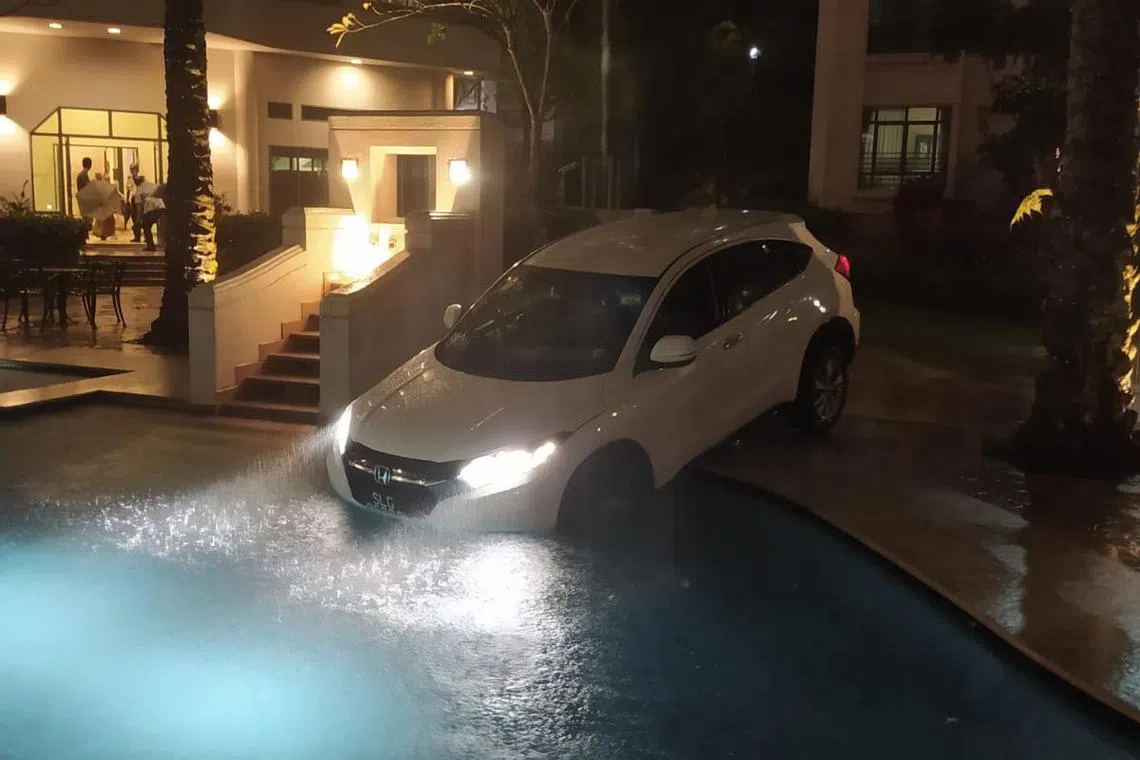 The driver of a white Honda Vezel drove into the wading pool of The Hillside condo on Tuesday night. 