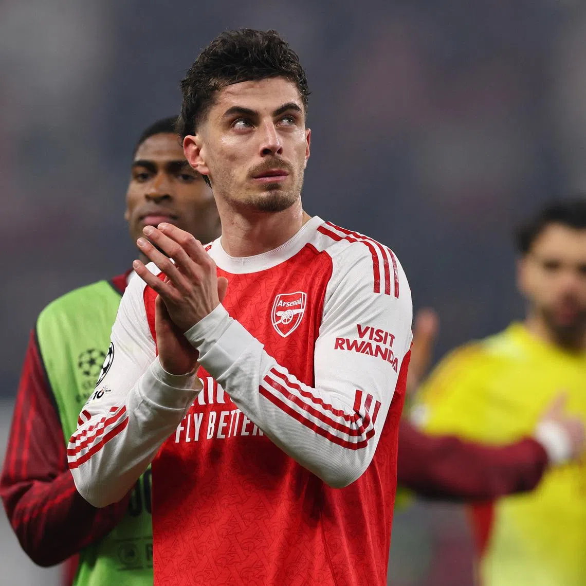 Soccer Football - UEFA Champions League - Round 16 - First Leg - Bayer Leverkusen v Arsenal - BayArena, Leverkusen, Germany - March 11, 2026 Arsenal's Kai Havertz applauds fans after the match REUTERS/Wolfgang Rattay