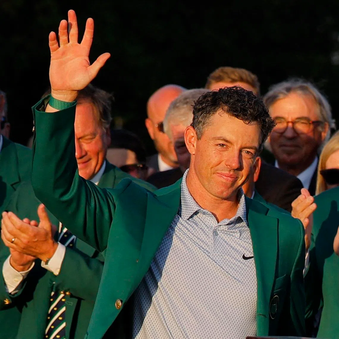 Golf - The Masters - Augusta National Golf Club, Augusta, Georgia, U.S. - April 12, 2026 Northern Ireland's Rory McIlroy celebrates with his green jacket after winning The Masters REUTERS/Mike Blake