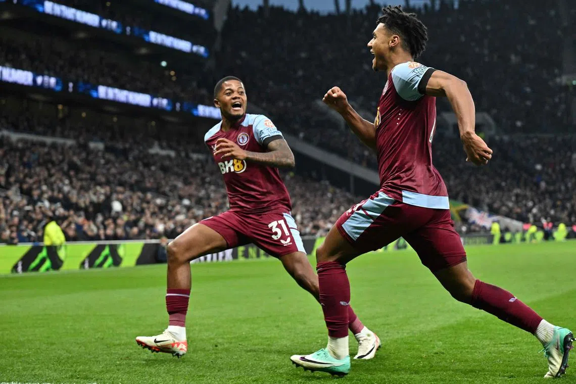 Aston Villa's English striker Ollie Watkins (right) celebrates scoring his team's winning goal during the English Premier League football match against Tottenham Hotspur at the Tottenham Hotspur Stadium on Nov 26. Villa won 2-1.