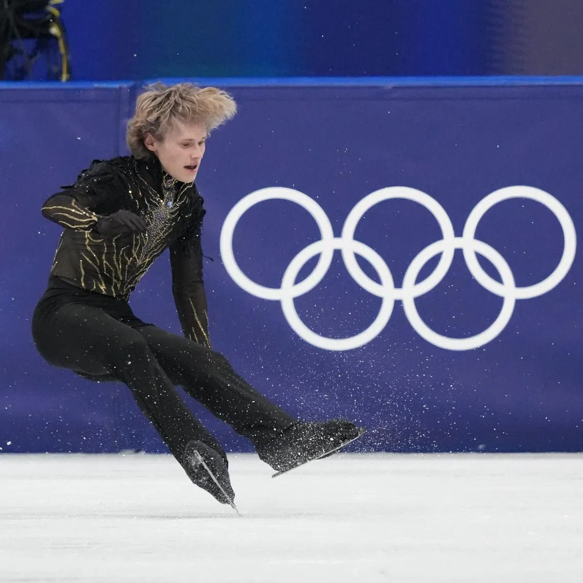 Feb 13, 2026; Milan, Italy; Ilia Malinin of the United States of America competes in the men’s singles free program during the Milano Cortina 2026 Olympic Winter Games at Milano Ice Skating Arena. Mandatory Credit: James Lang-Imagn Images