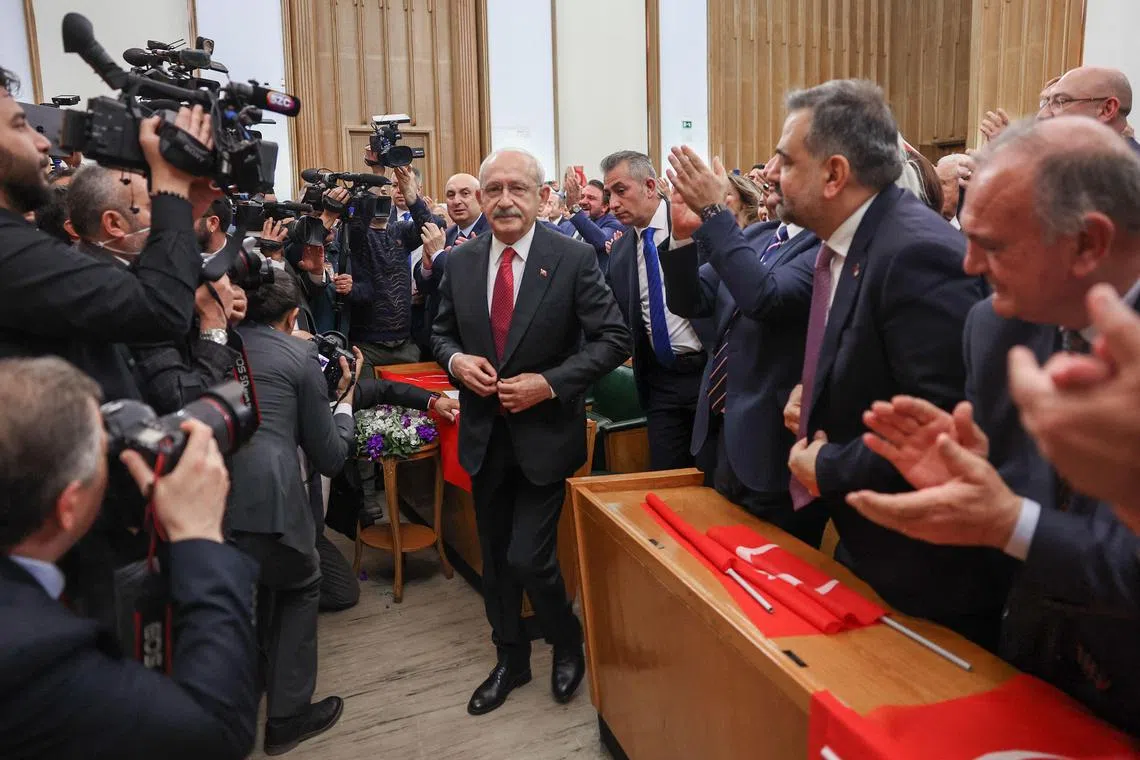 Mr Kemal Kilicdaroglu (centre) emerged victorious from a bruising leadership battle between the heads of six parties united against Turkey's president.