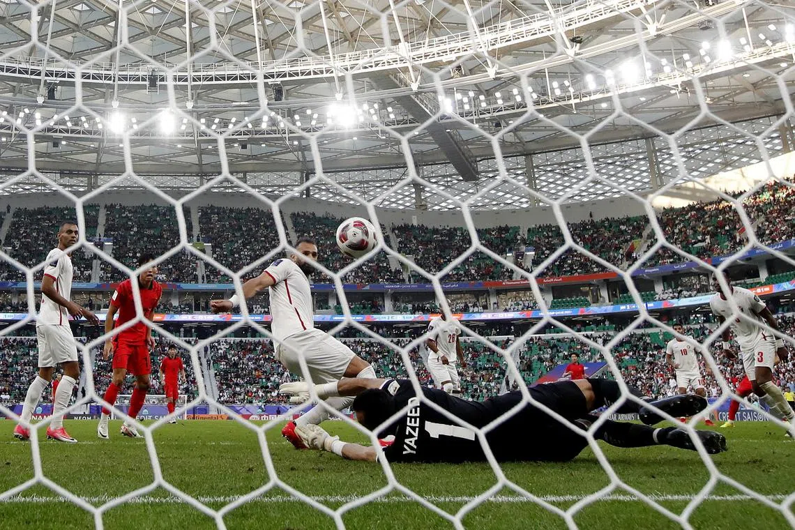 Jordan's Yazan Al Arab scores an own goal and South Korea's second.