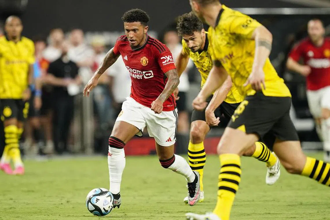 FILE PHOTO: Jul 30, 2023; Las Vegas, Nevada, USA; Manchester United forward Jadon Sancho (25) runs the ball against Borussia Dortmund during the first half at Allegiant Stadium. Mandatory Credit: Lucas Peltier-USA TODAY Sports/File Photo