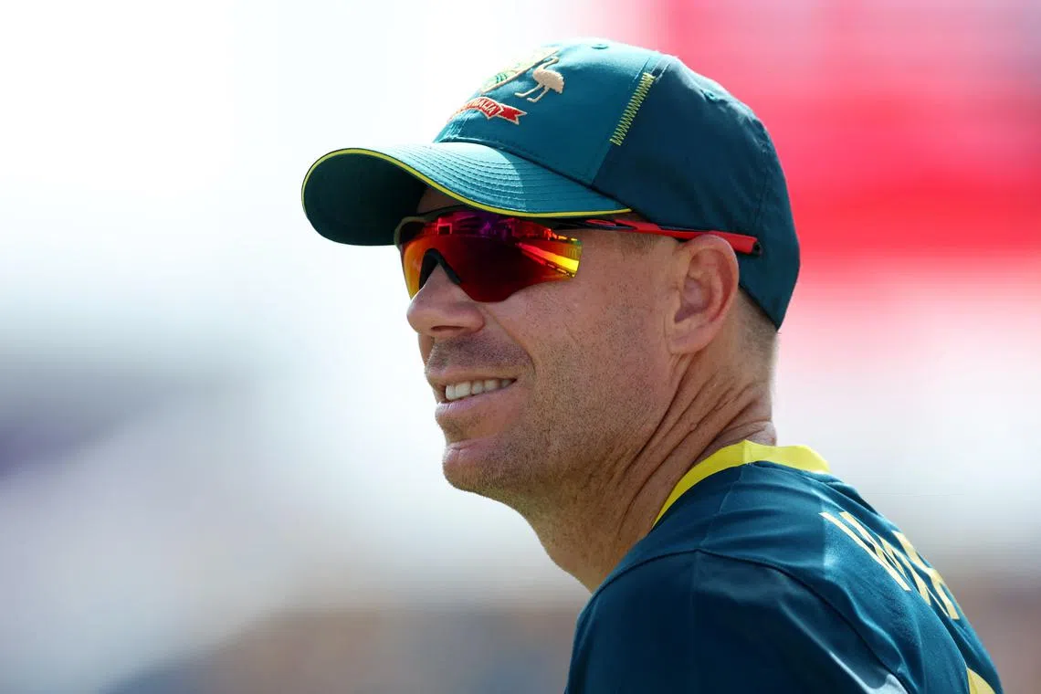 FILE PHOTO: Cricket - ICC T20 World Cup 2024 - Group B - Australia v England - Kensington Oval, Bridgetown, Barbados - June 8, 2024 Australia's David Warner looks on REUTERS/Ash Allen