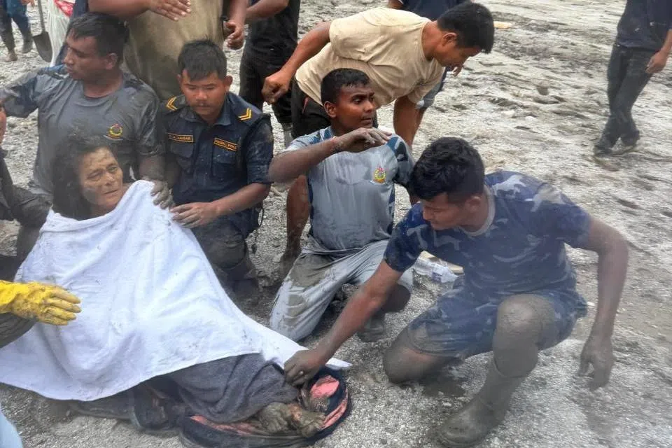 Chandika Kumari Shrestha survived for days in a narrow pocket of air amid water and mud.