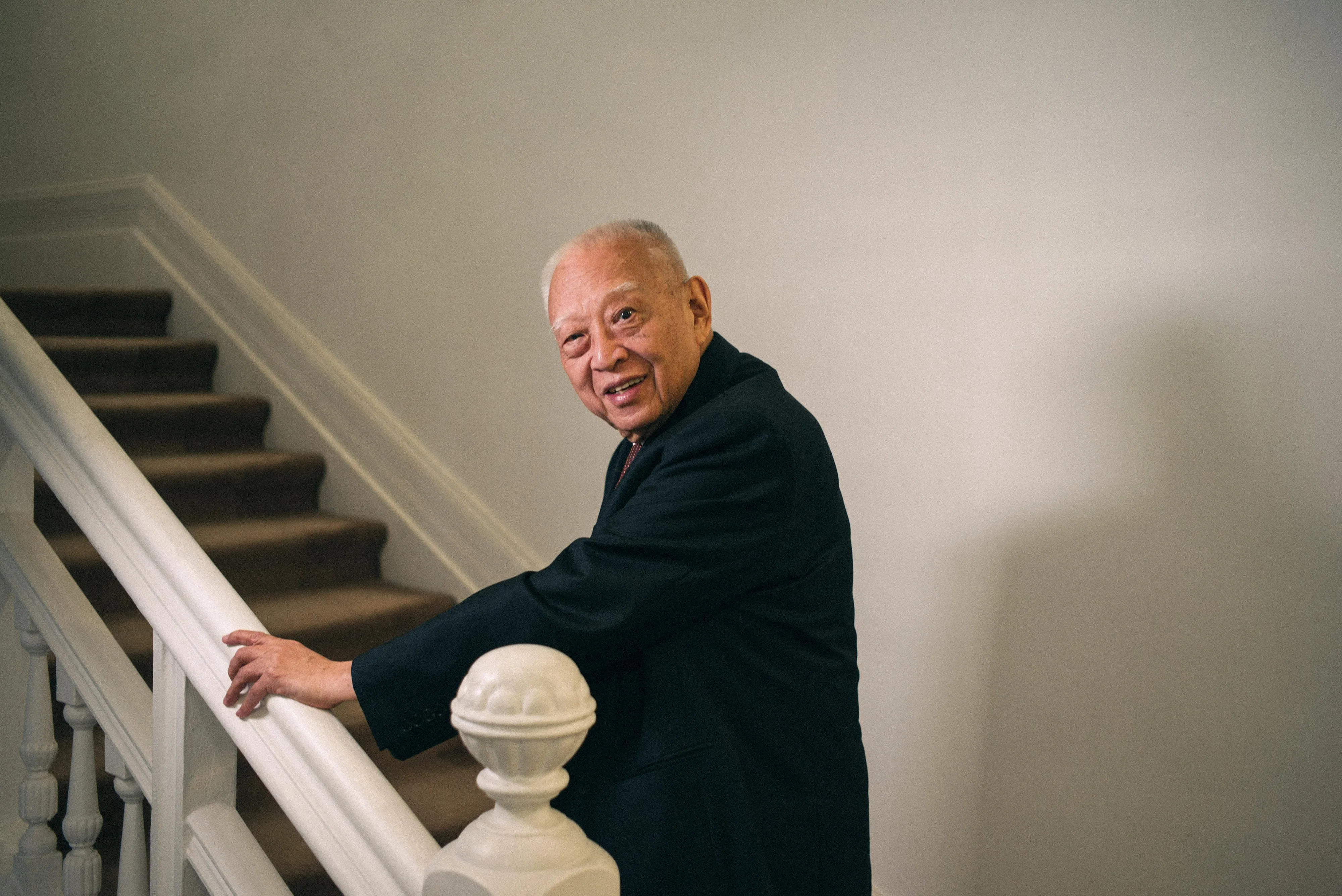 Tung Chee-hwa, Hong Kong's former chief executive, poses for a photograph ahead of a Bloomberg Television interview in Hong Kong, China, on Wednesday, June 21, 2017. Tung, Hong Kong's first leader after the city’s return to Chinese rule, blamed soaring property prices on a lack of land supply and highlighted the social divisions caused by rising housing costs. Photographer: Billy H.C. Kwok/Bloomberg