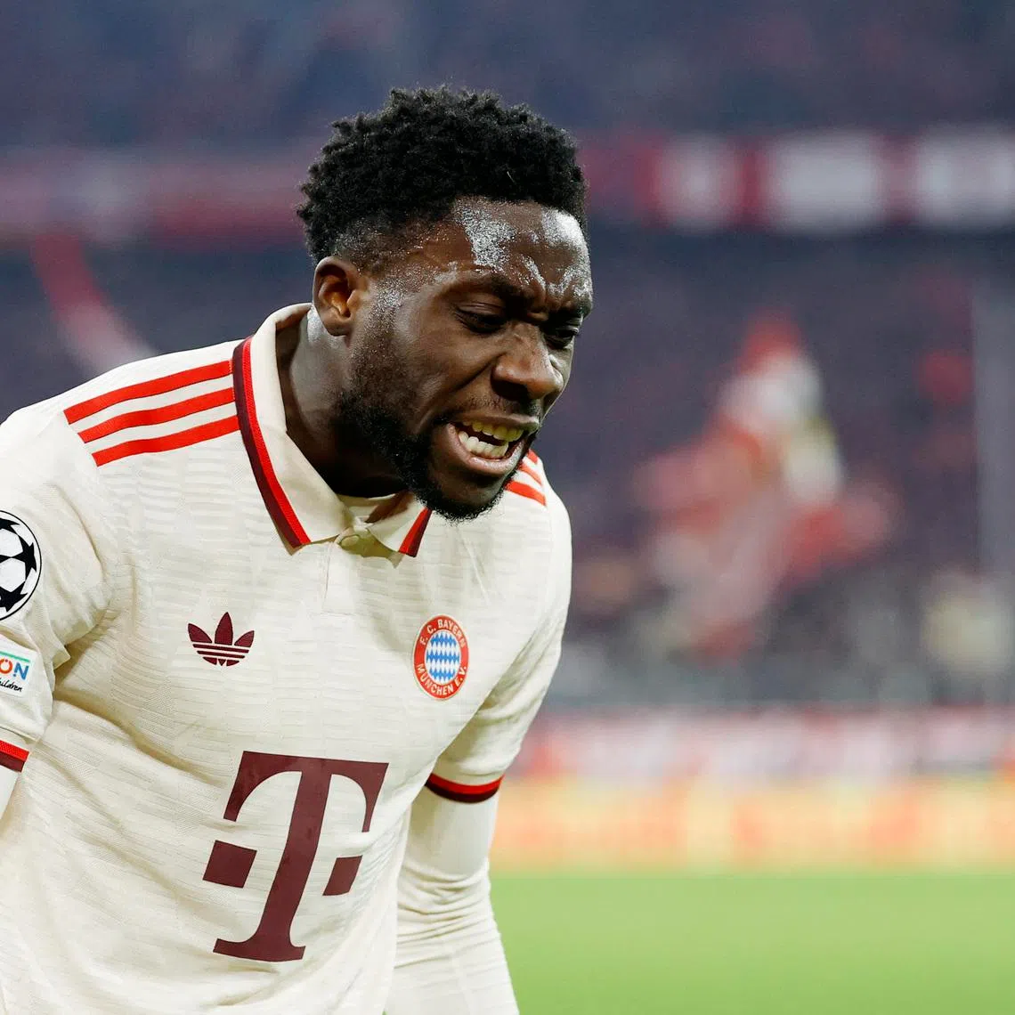 Soccer Football - Champions League - Round of 16 - First Leg - Bayern Munich v Bayer Leverkusen - Allianz Arena, Munich, Germany - March 5, 2025  Bayern Munich's Alphonso Davies reacts REUTERS/Heiko Becker/File Photo