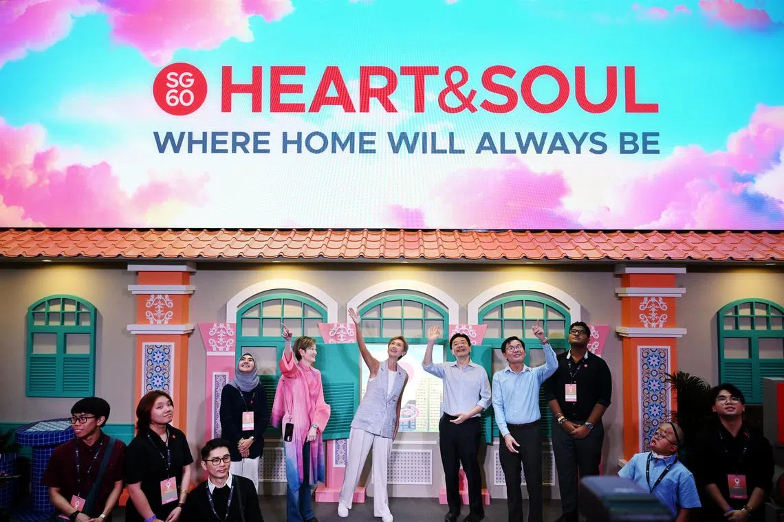 Prime Minister Lawrence Wong (centre, right) at the launch of the SG60 Heart&Soul Experience at Orchard Library on Aug 26.