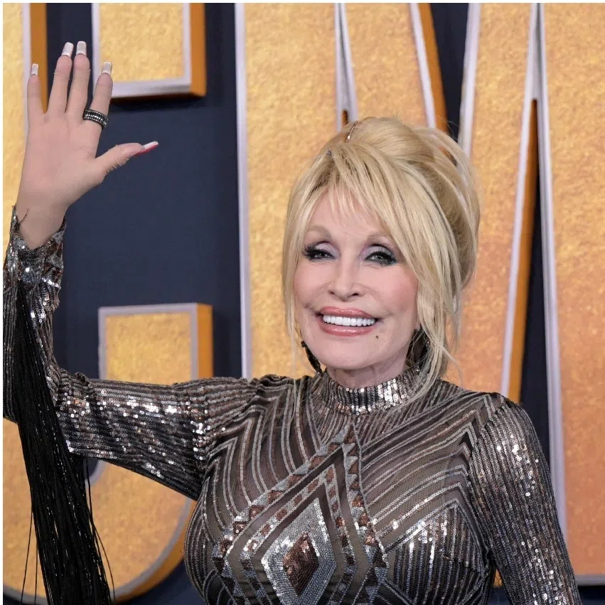 US flags flies at half-staff in front of the White House in memory of Dolly Parton on Aug 25, after it was announced that the country music icon died aged 80.