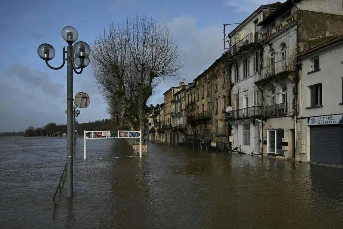 A flooded street in La Reole, south-western France, on Feb 12, amid Storm Nils, which has disrupted travel and brought chaos to roads in southern France, northern Spain and parts of Portugal.