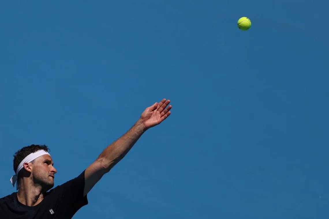 Bulgaria's Grigor Dimitrov practices in the lead-up to the 2022 Australian Open tennis tournament at Melbourne Park in Melbourne, Australia, January 2, 2022.  REUTERS/Loren Elliott/File Photo