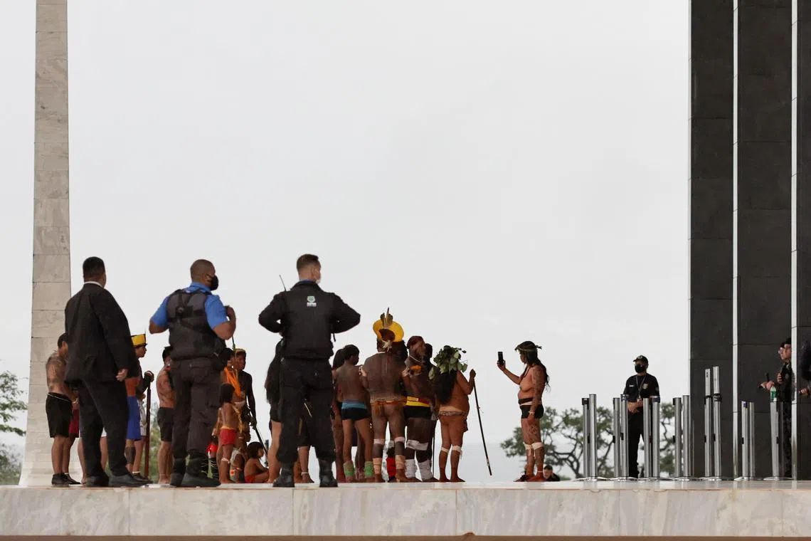 Indigenous people supporting President Jair Bolsonaro protest in front of the Supreme Court, in Brasilia, Brazil, December 25, 2022. REUTERS/Ueslei Marcelino

