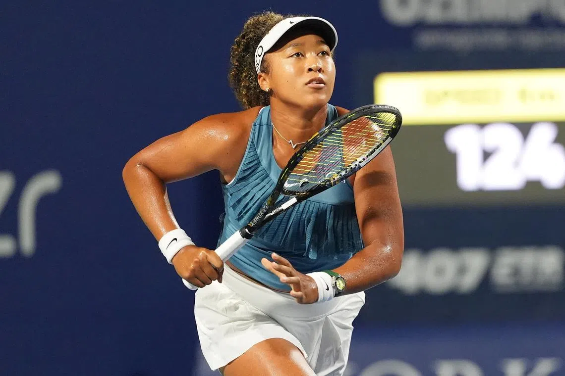 Aug 8, 2024; Toronto, Ontario, Canada; Naomi Osaka (JPN) runs towards the net to get to a ball hit by Elise Mertens (not pictured) during the second round of play at Sobeys Stadium. Mandatory Credit: John E. Sokolowski-USA TODAY Sports/ File Photo