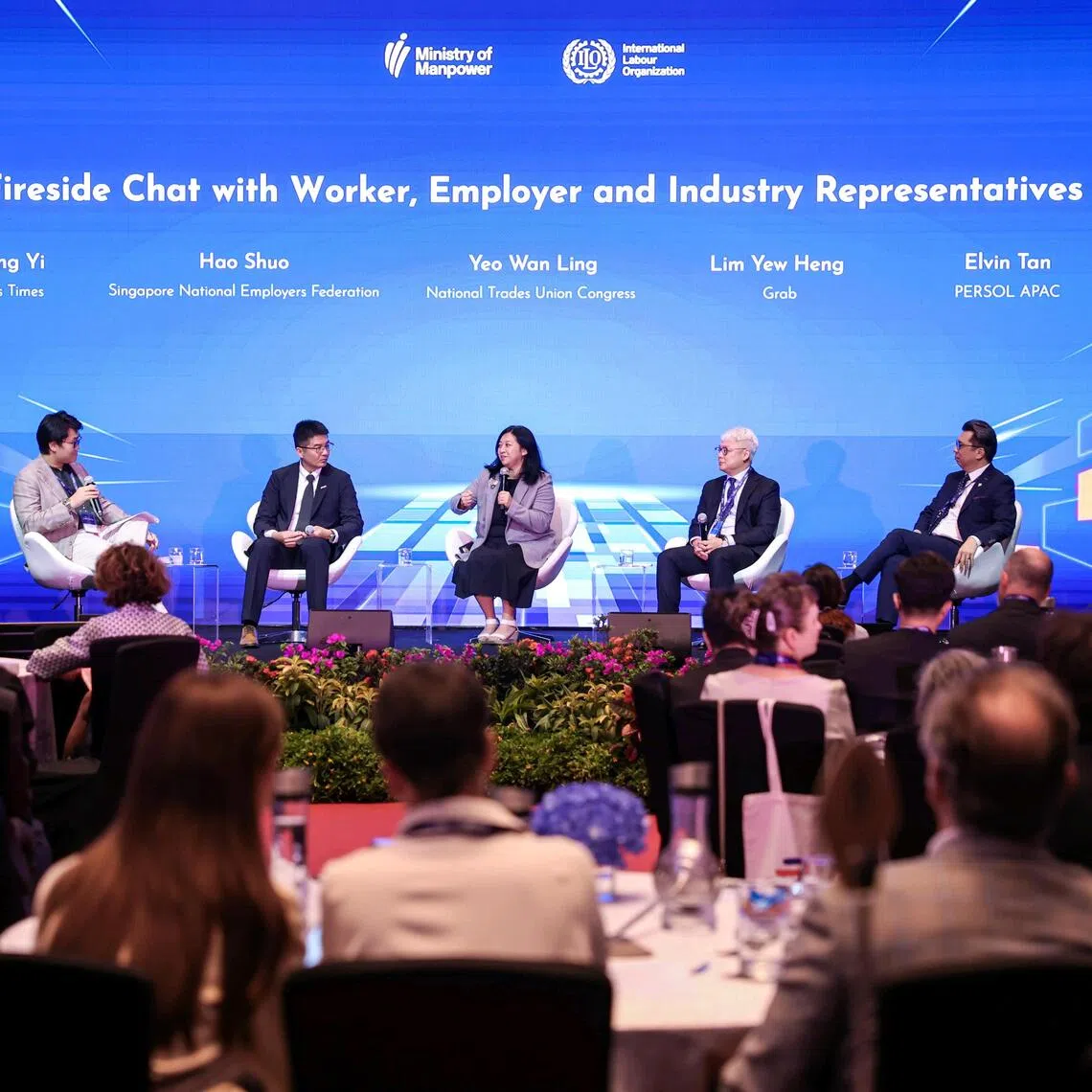 (From left) ST correspondent Tay Hong Yi moderating a fireside chat with SNEF CEO Hao Shuo, NTUC assistant secretary-general Yeo Wan Ling, Grab’s group managing director Lim Yew Heng and Persol's regional head of operations and director for the Asia-Pacific region Elvin Tan.