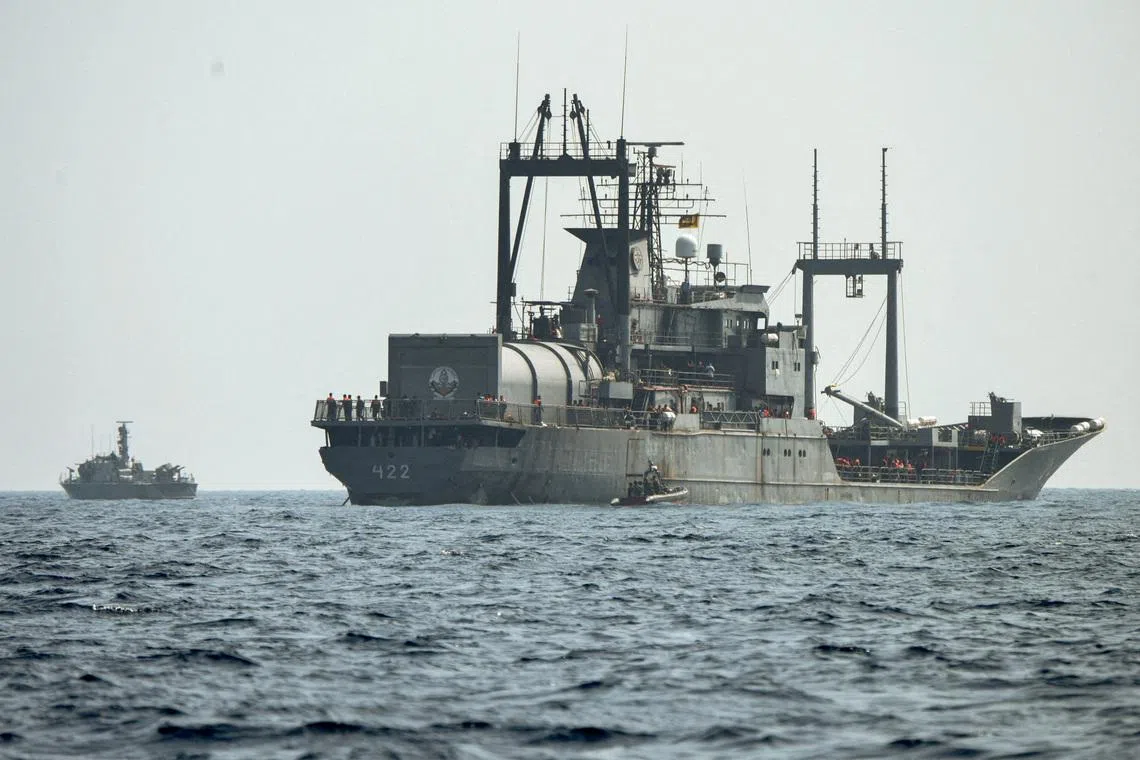 FILE PHOTO: A Sri Lanka Navy vessel approaches an Iranian Navy vessel IRIS Bushehr (422) during a rescue operation, a day after the crew of a distressed Iranian military ship, IRIS Dena, were assisted in waters south of Sri Lanka, off the coast of Colombo, Sri Lanka, March 5, 2026. Sri Lanka Navy/Handout via REUTERS/File Photo