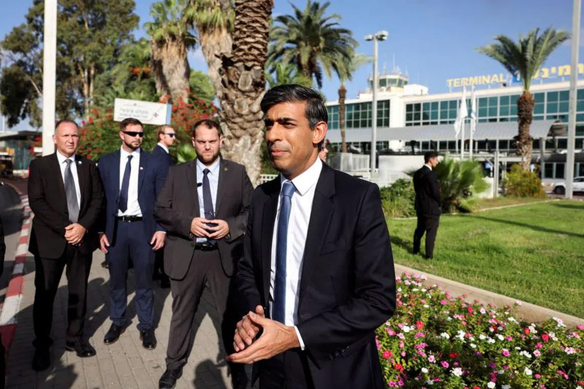 British Prime Minister Rishi Sunak speaks to the media after landing at Ben Gurion international airport in Lod, Near Tel Aviv, Israel October 19, 2023. REUTERS/Ronen Zvulun     TPX IMAGES OF THE DAY
