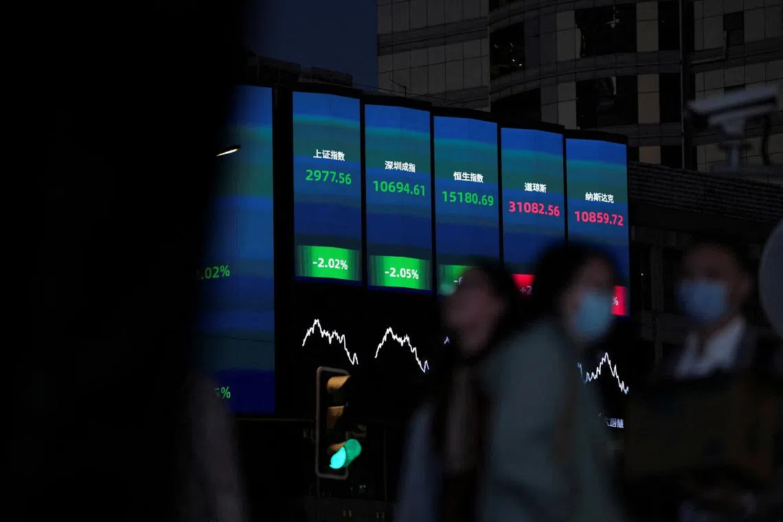 FILE PHOTO: A view of a giant display of stock indexes, following the coronavirus disease (COVID-19) outbreak, in Shanghai, China, October 24, 2022. REUTERS/Aly Song/File Photo