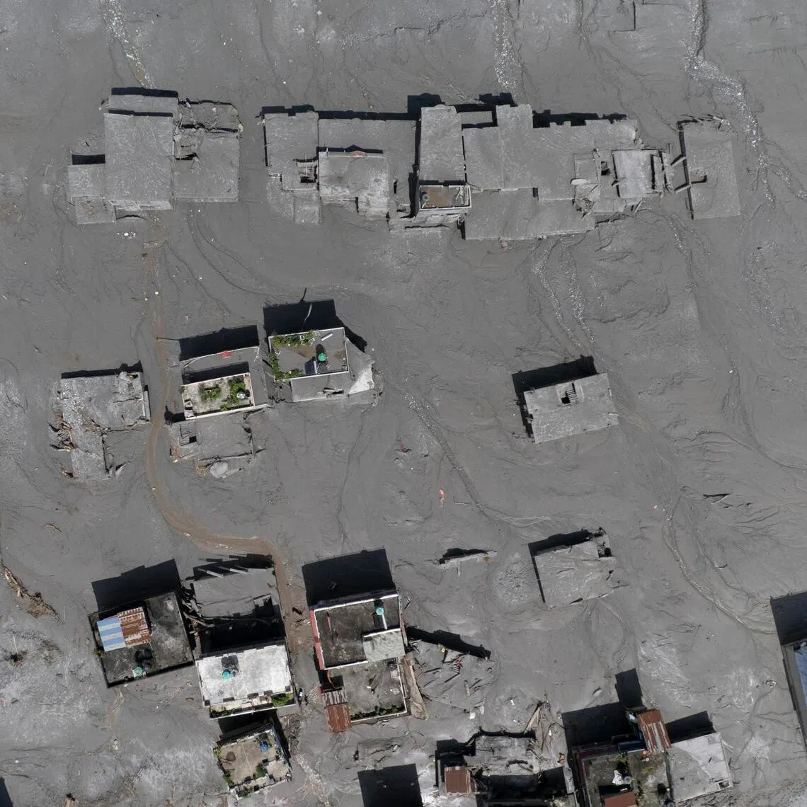 An aerial view of damaged homes in Delight village following a flash flood in Nuwakot district in Nepal on Aug 27.