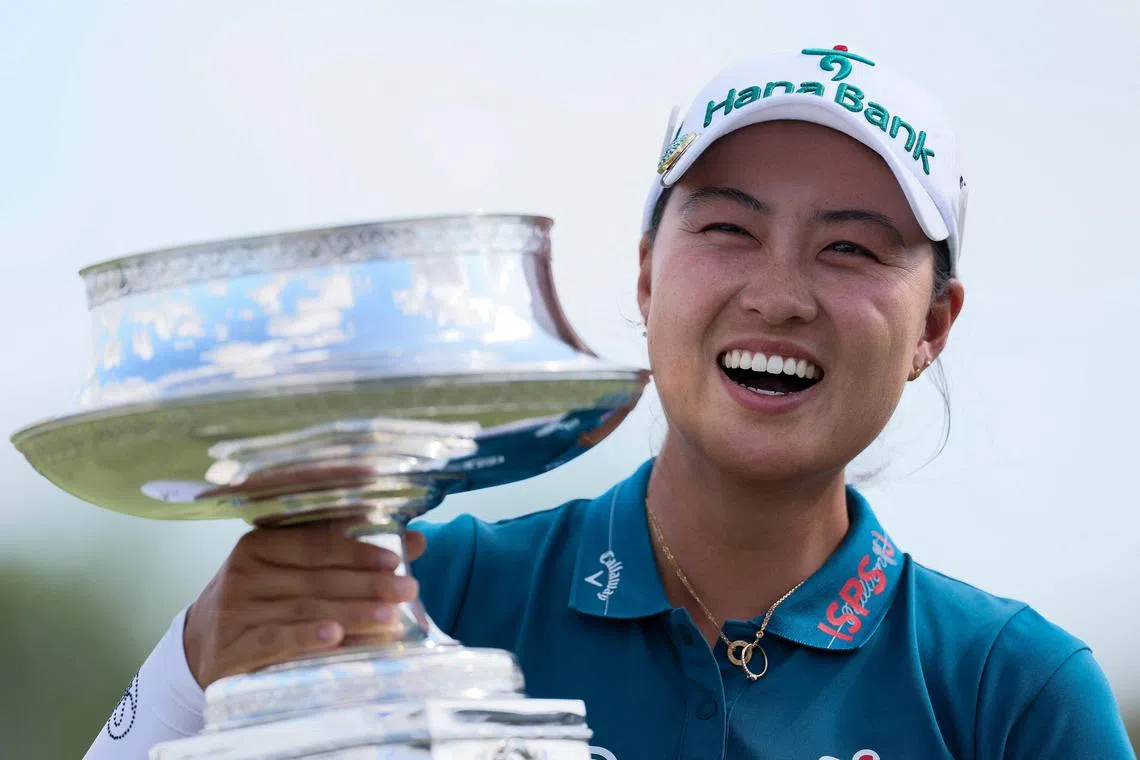 Minjee Lee of Australia posing with the trophy after winning the Women's PGA Championship 2025 at Fields Ranch East at PGA Frisco on June 22, 2025 in Frisco, Texas. She carded a final round 74 for a four-under 284 for the week and her first win since October 2023.