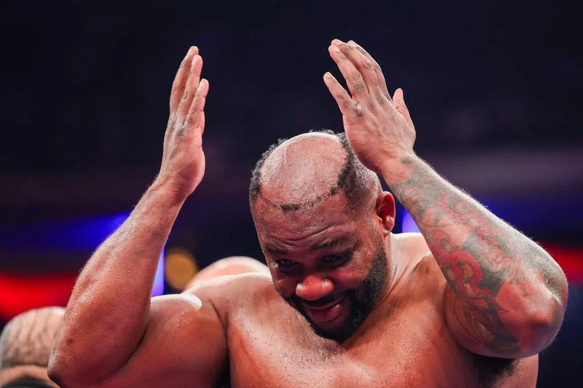 Jarrell Miller reacts to his toupee falling off in a heavyweight bout against Kingsley Ibeh at Madison Square Garden on Jan 31.