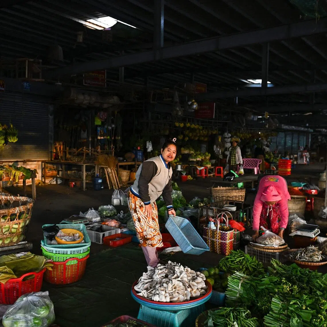Vegetable vendors at a market in Myanmar's capital Naypyitaw on Dec 29, a day after the first phase of the country's general election.
