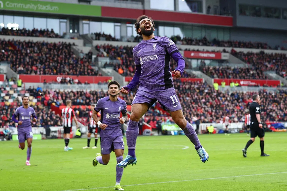 Liverpool's Mohamed Salah celebrating after scoring their third goal in the 4-1 English Premier League win over Brentford at the Brentford Community Stadium on Feb 17.