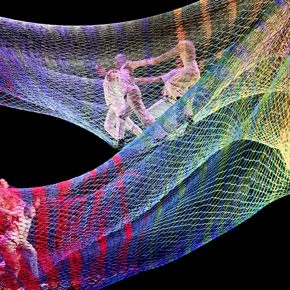 Noli Timere is an aerial performance on a net sculpture.
