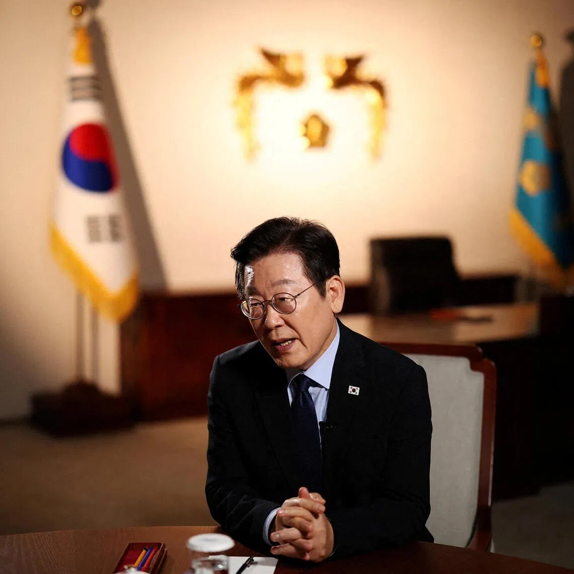 South Korean President Lee Jae Myung answers a reporter's question during an interview with Reuters at the Presidential Office in Seoul, South Korea, September 19, 2025.   REUTERS/Kim Hong-Ji     TPX IMAGES OF THE DAY     