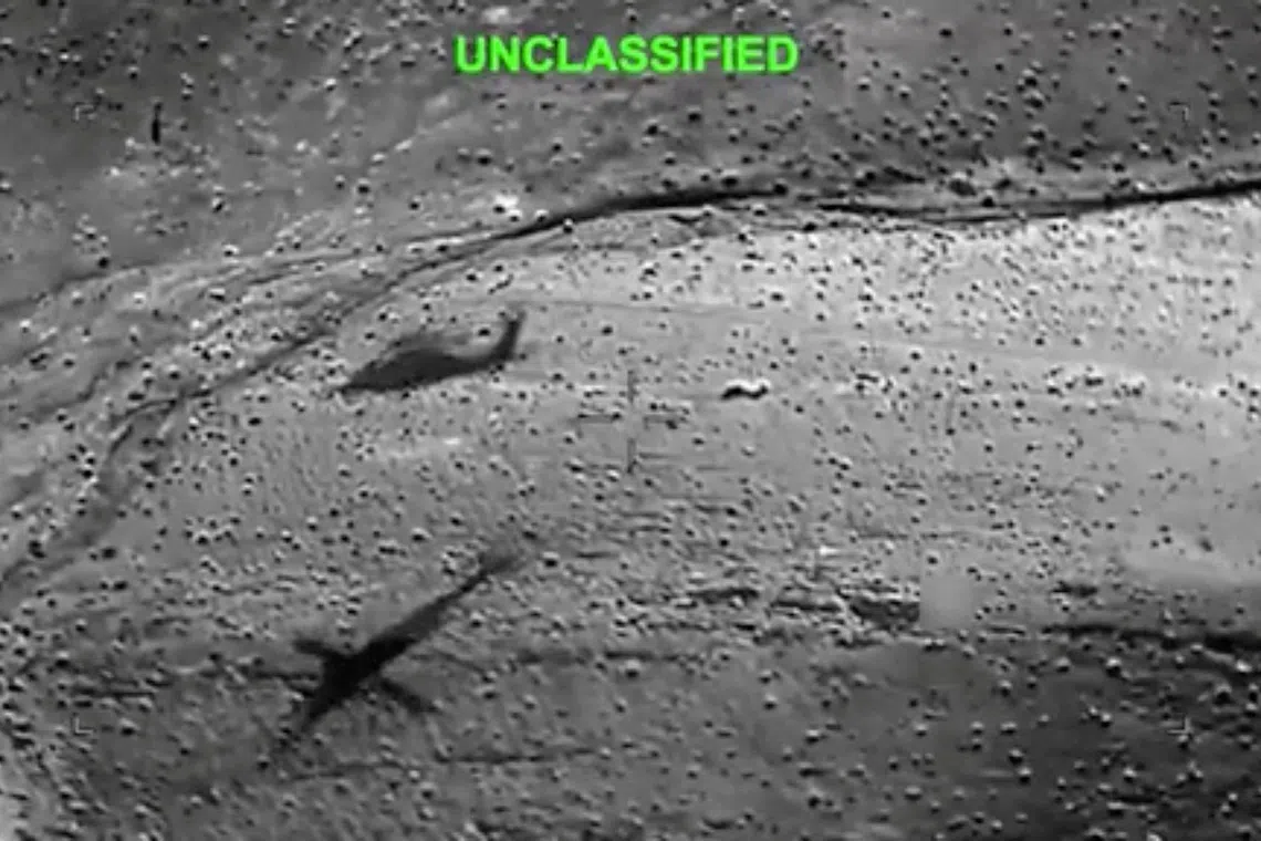 A helicopter flies over an area during what is said to be the rescue operation of a U.S. airman who was stranded in Iran after an F-15 jet was shot down, amid the U.S.-Israeli conflict with Iran, at an undisclosed location, in this still image from video released September 15, 2026. DVIDS/Handout via REUTERS THIS IMAGE HAS BEEN SUPPLIED BY A THIRD PARTY. BLURRING AND OVERLAY FROM SOURCE. VERIFICATION - Location and date could not be verified. - A U.S official had previously told Reuters that an American weapons specialist stranded in Iran was moved to safety on April 5, 2026 by US military. - U.S. President Donald Trump said in a social media post on April 5 that a service member had been rescued. TPX IMAGES OF THE DAY