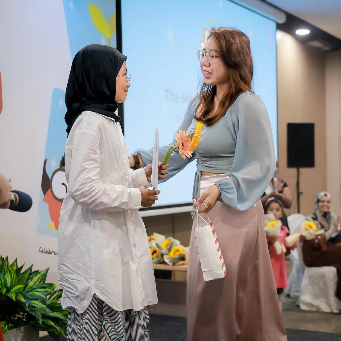 Bone marrow recipient Ria Nadira meeting her donor Ms Ms Nur Siti Zubaidah for the first time at Bone Marrow Donor Programme?s Mass Donor-Recipient Meet held at the Bidadari Community Club on World Marrow Donor Day, Sep 21, 2024.