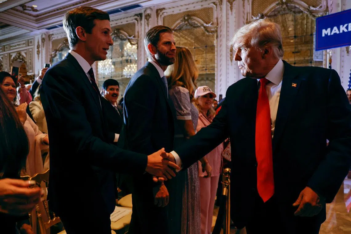 Mr Donald Trump shakes hands with his son-in-law, Mr Jared Kushner, in front of his son Eric after announcing that he will once again run for US president in 2024.