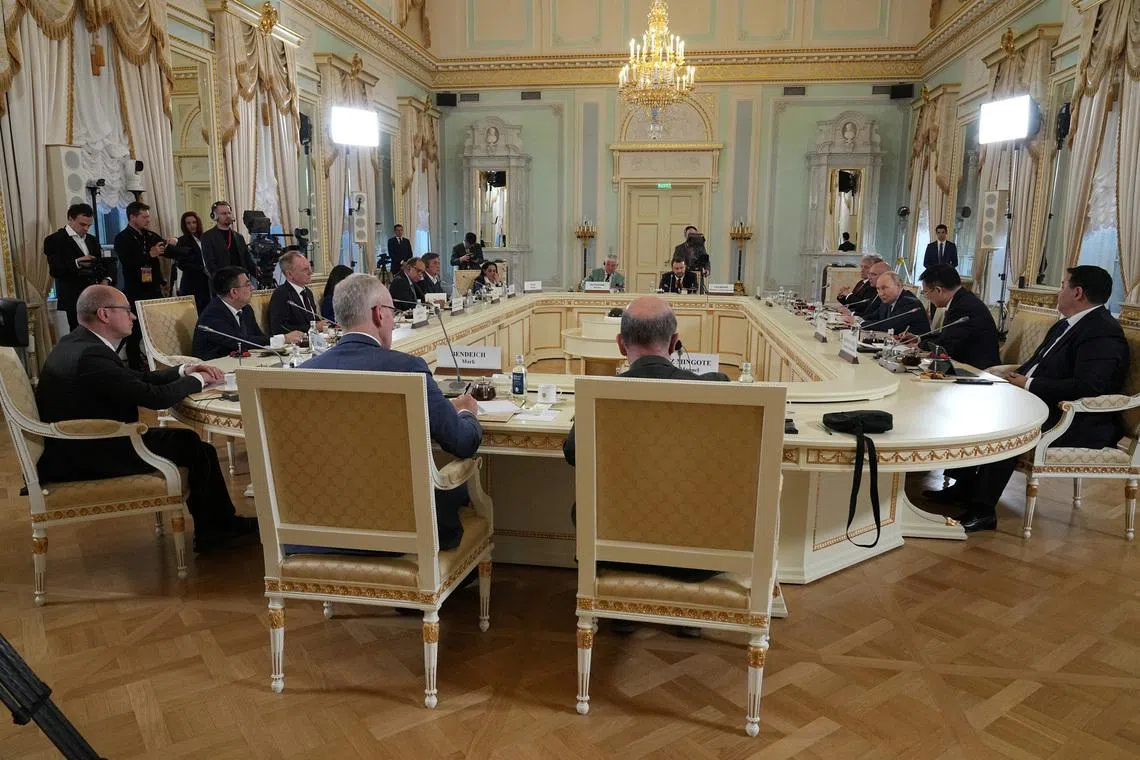 Russian President Vladimir Putin meets with representatives of international news agencies on the sidelines of the St. Petersburg International Economic Forum, at the Constantine Palace in St. Petersburg, Russia, June 4, 2026.  Dmitri Lovetsky/Pool via REUTERS