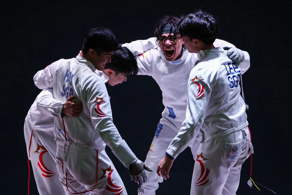 National fencer Samson Lee (second from right) was withdrawn from the SEA Games squad in Cambodia.