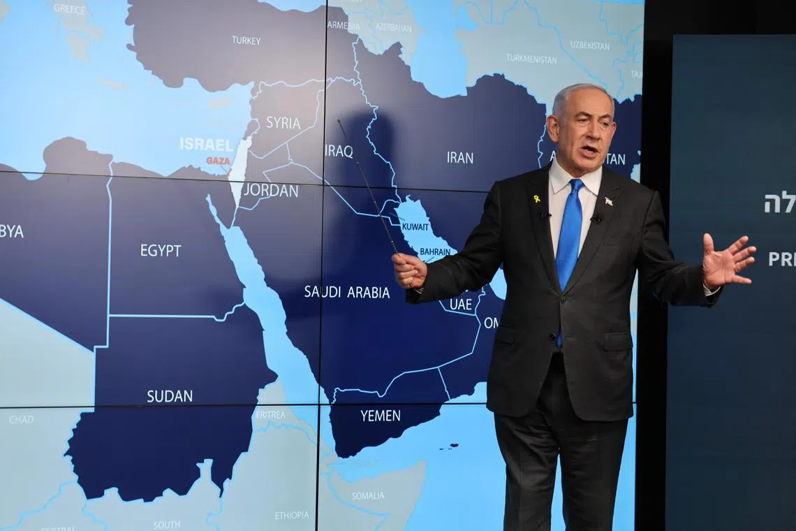 Israeli Prime Minister Benjamin Netanyahu standing before a map of the Middle East , during a press conference in Jerusalem, on Sept 4.