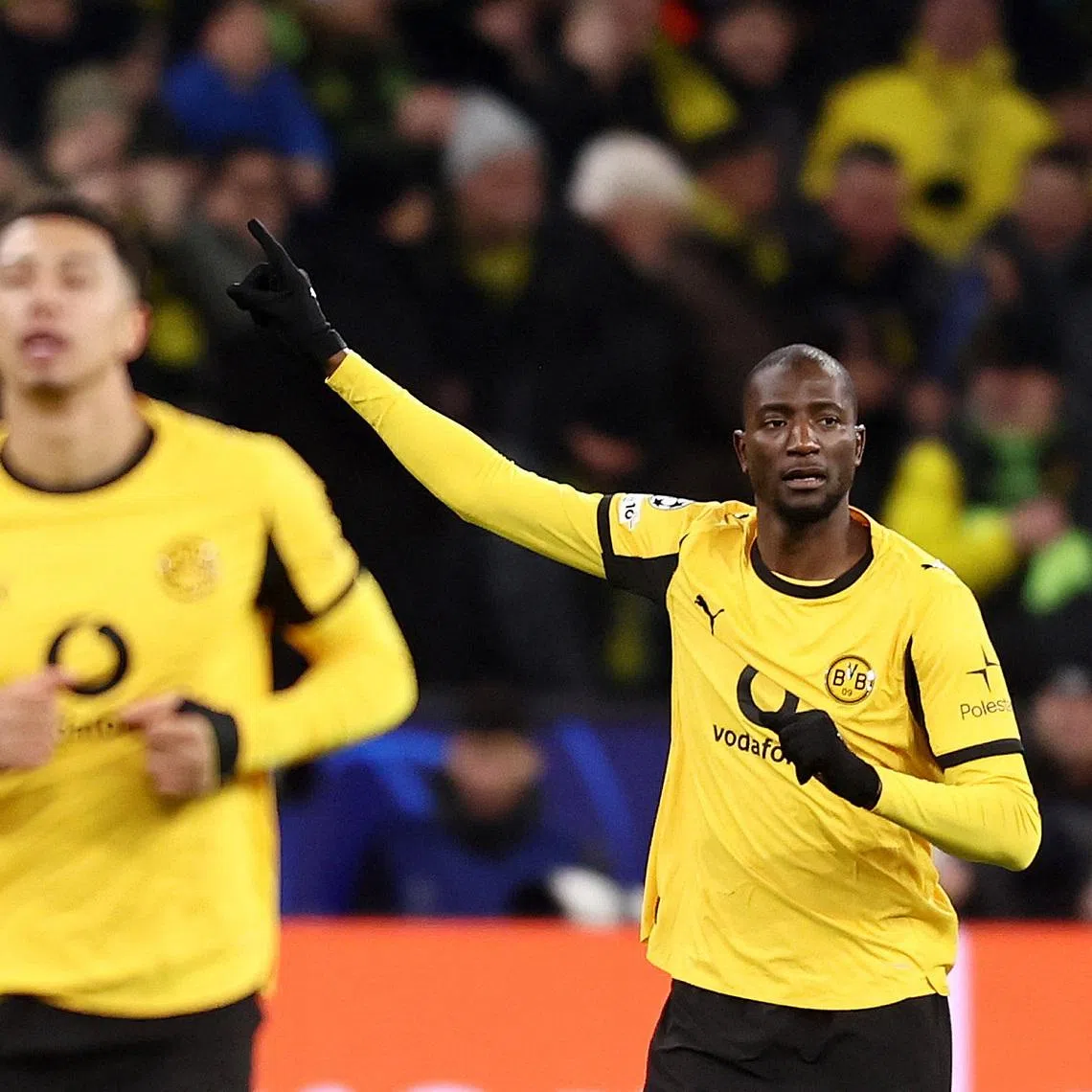 Soccer Football - UEFA Champions League - Play Off - First Leg - Borussia Dortmund v Atalanta - Signal Iduna Park, Dortmund, Germany - February 17, 2026 Borussia Dortmund's Serhou Guirassy celebrates scoring their first goal REUTERS/Leon Kuegeler