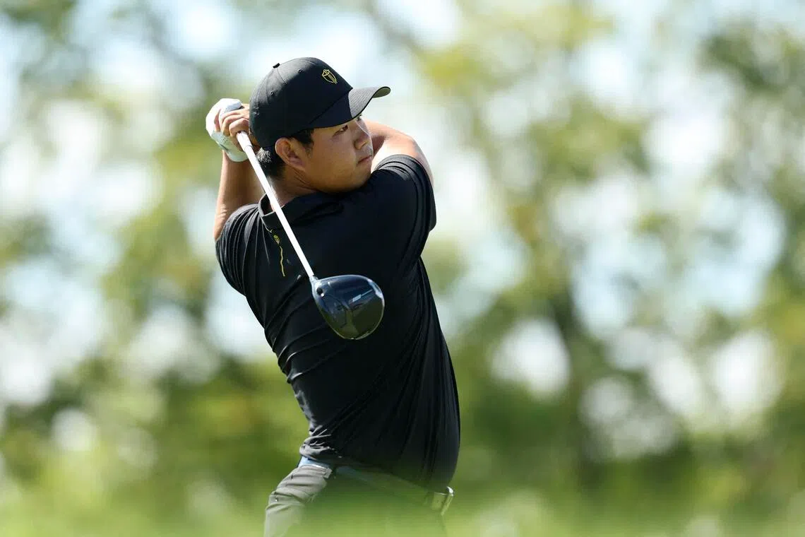 Tom Kim, seen here at the Presidents Cup, shot a three-under 67 for a share of seventh on his Asian Games debut.