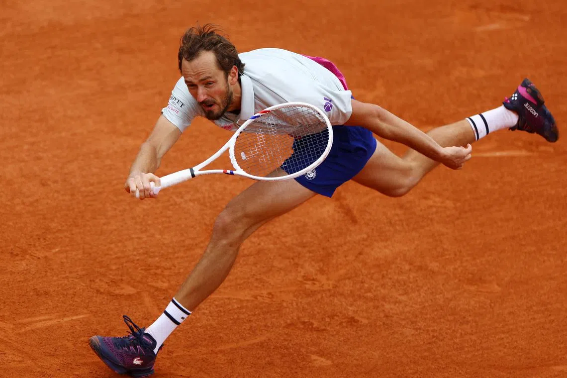 FILE PHOTO: Tennis - French Open - Roland Garros, Paris, France - May 27, 2025, Russia's Daniil Medvedev in action during his first-round match against Britain's Cameron Norrie REUTERS/Lisi Niesner/File Photo