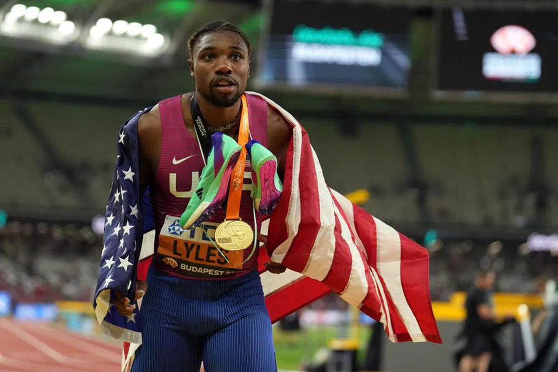 Aug 25, 2023; Budapest, Hungary; Noah Lyles (USA) poses for photographs after winning the mens 200m race during the 2023 World Athletics Championships at National Athletics Centre. Mandatory Credit: Kirby Lee-USA TODAY Sports