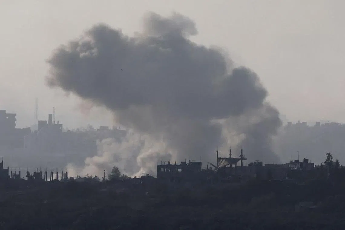 Smoke rises in the northern Gaza Strip following an Israeli strike, amid the ongoing conflict between Israel and Palestinian Islamist group Hamas, as seen from southern Israel, November 8, 2023. REUTERS/Ammar Awad