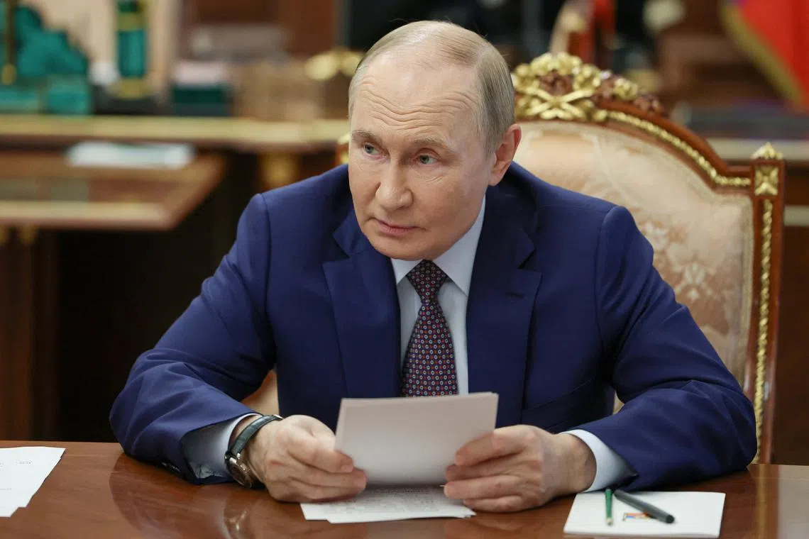 FILE PHOTO: Russia's President Vladimir Putin chairs a meeting on economic issues in Moscow, Russia, August 12, 2025. Sputnik/Vyacheslav Prokofyev/Pool via REUTERS/File Photo