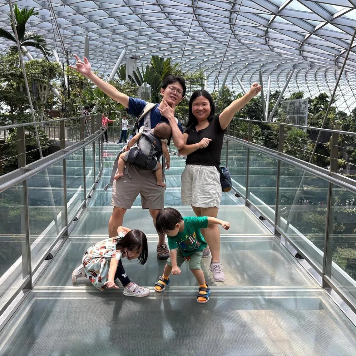 mwdad - Stay-at-home dad Mr Abraham Yeo, 45. together with his wife, Ms Peng Cheng Yu, 31, and their three children aged five, three and one.

credit Abraham Yeo