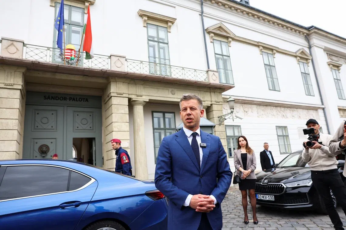 Election winner Peter Magyar, leader of the opposition Tisza Party speaks to the media ahead of a meeting with Hungary's President Tamas Sulyok after the parliamentary election, at Sandor Palace in Budapest, Hungary, April 15, 2026. REUTERS/Bernadett Szabo