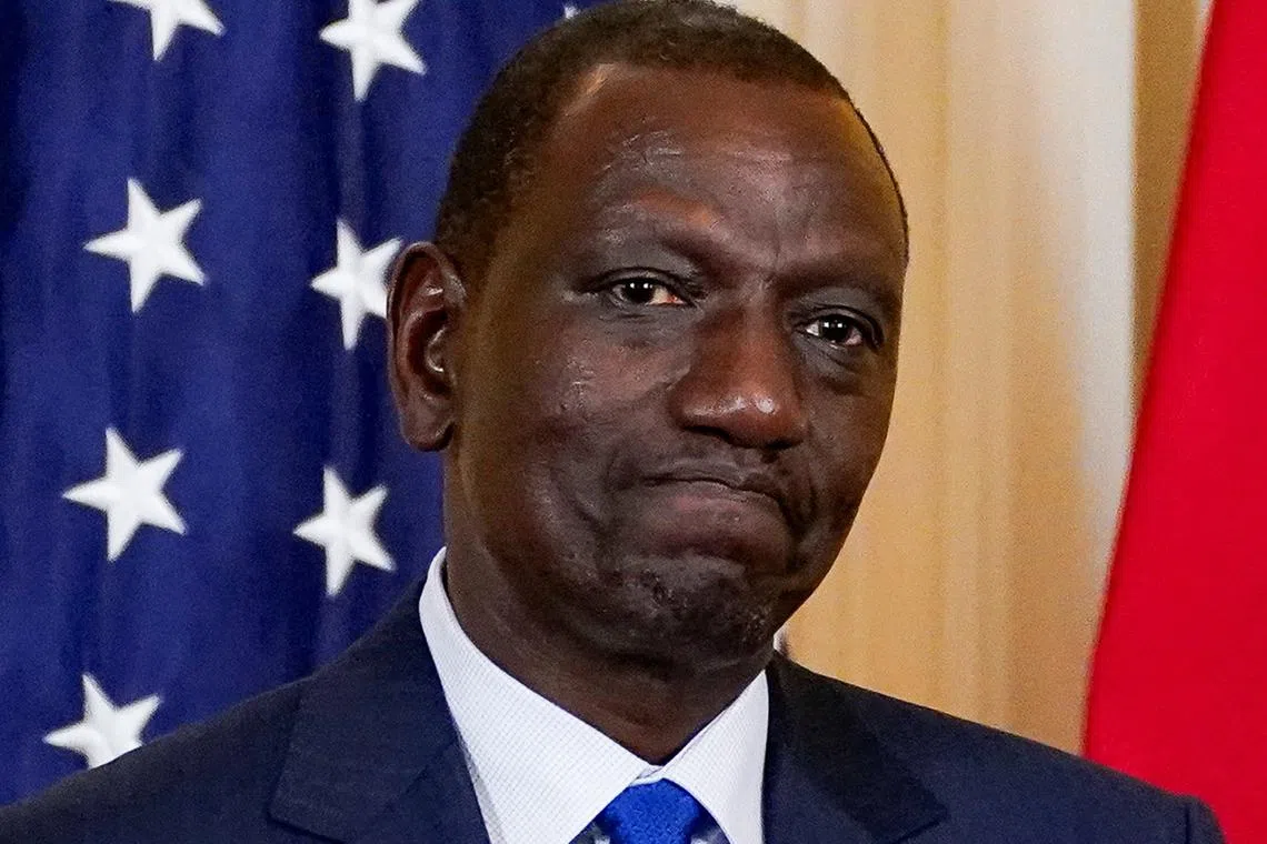 Kenyan President William Ruto reacts during a joint press conference with U.S. President Joe Biden at the White House in Washington, U.S., May 23, 2024. REUTERS/Elizabeth Frantz/File Photo