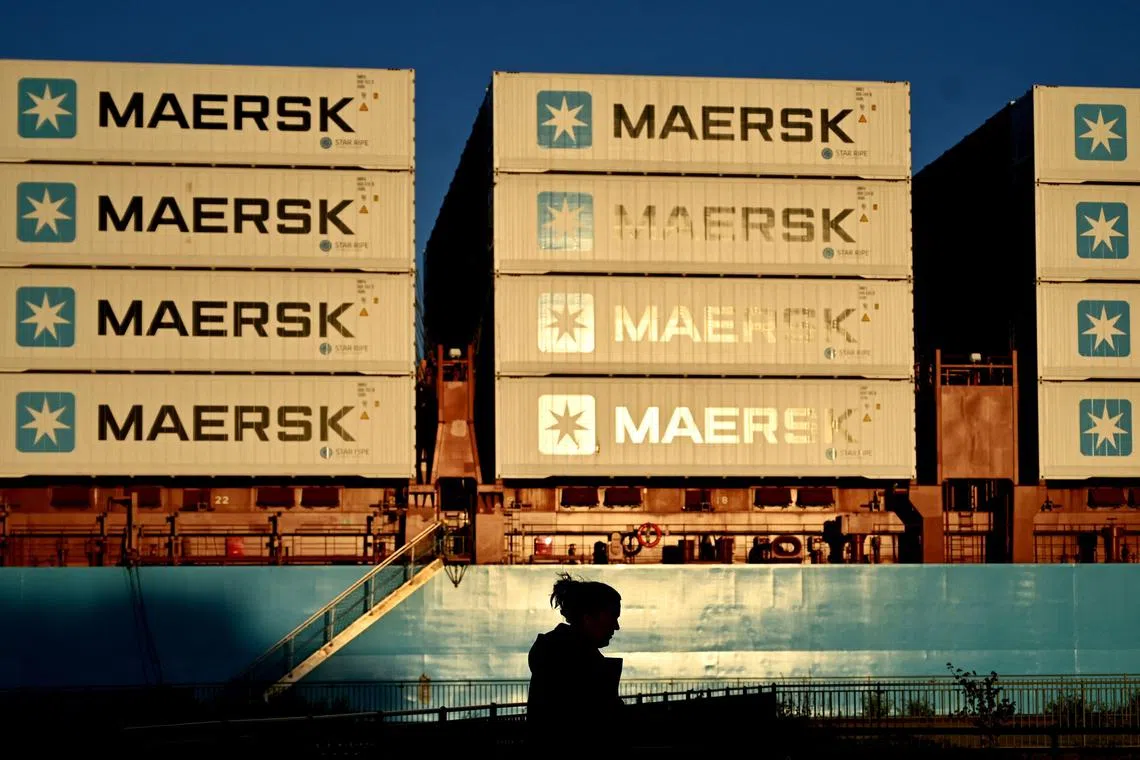 Containers of Danish shipping and logistics company Maersk are seen in Copenhagen, Denmark, on September 14, 2023. Built in South Korea by Hyundai Heavy Industries (HHI) and fitted with a dual-fuel engine, "Laura Maersk" is a relatively small model that will be able to transport 2,136 20-foot (TEU) containers. It will begin operating in the Baltic Sea in October 2023, Maersk said. (Photo by SERGEI GAPON / AFP)