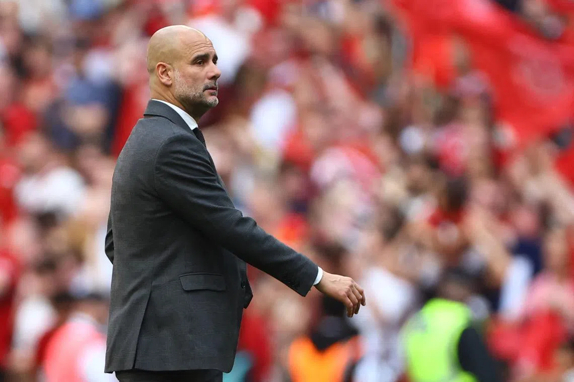 Soccer Football - FA Cup - Final - Manchester City v Manchester United - Wembley Stadium, London, Britain - May 25, 2024 Manchester City manager Pep Guardiola looks dejected after the match REUTERS/Hannah Mckay