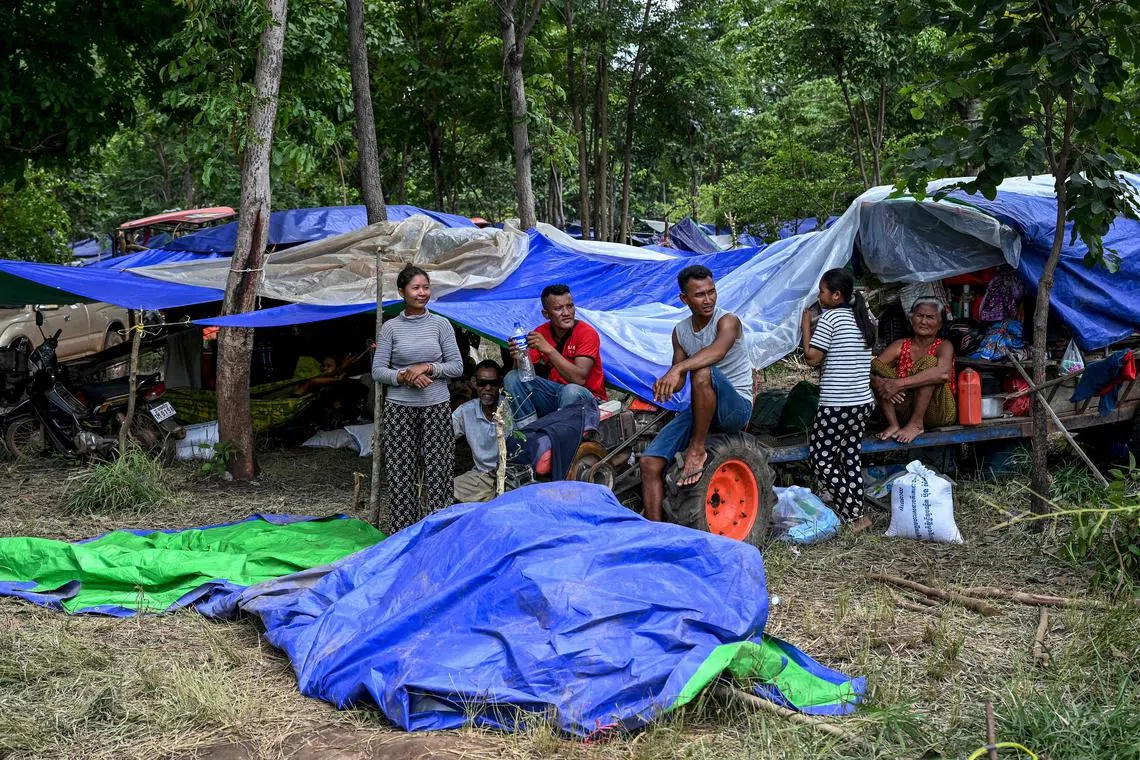 Displaced Cambodians camp near a pagoda at Oddar Meanchey province, on July 29.